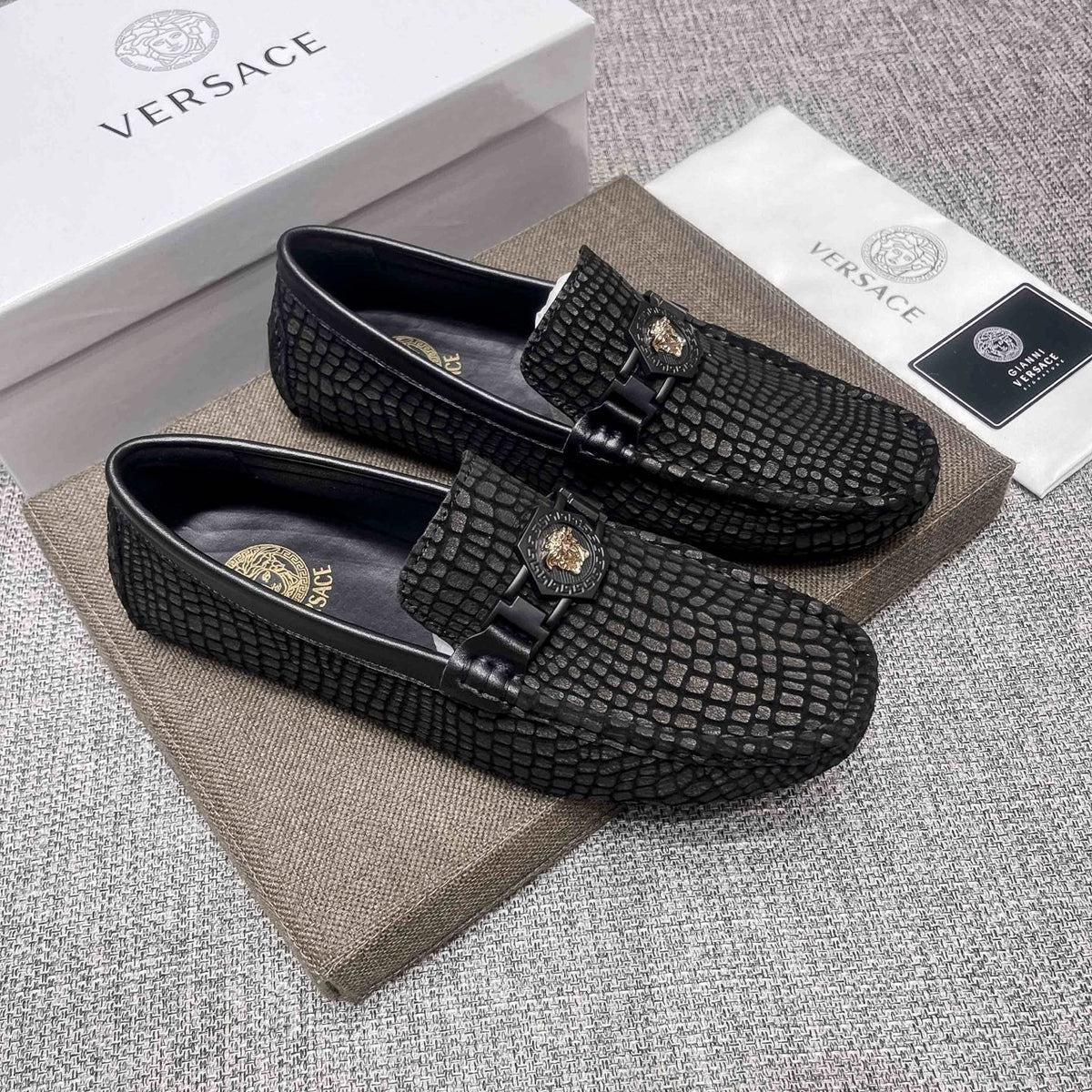 Versace Black Textured Driving Loafers — hero