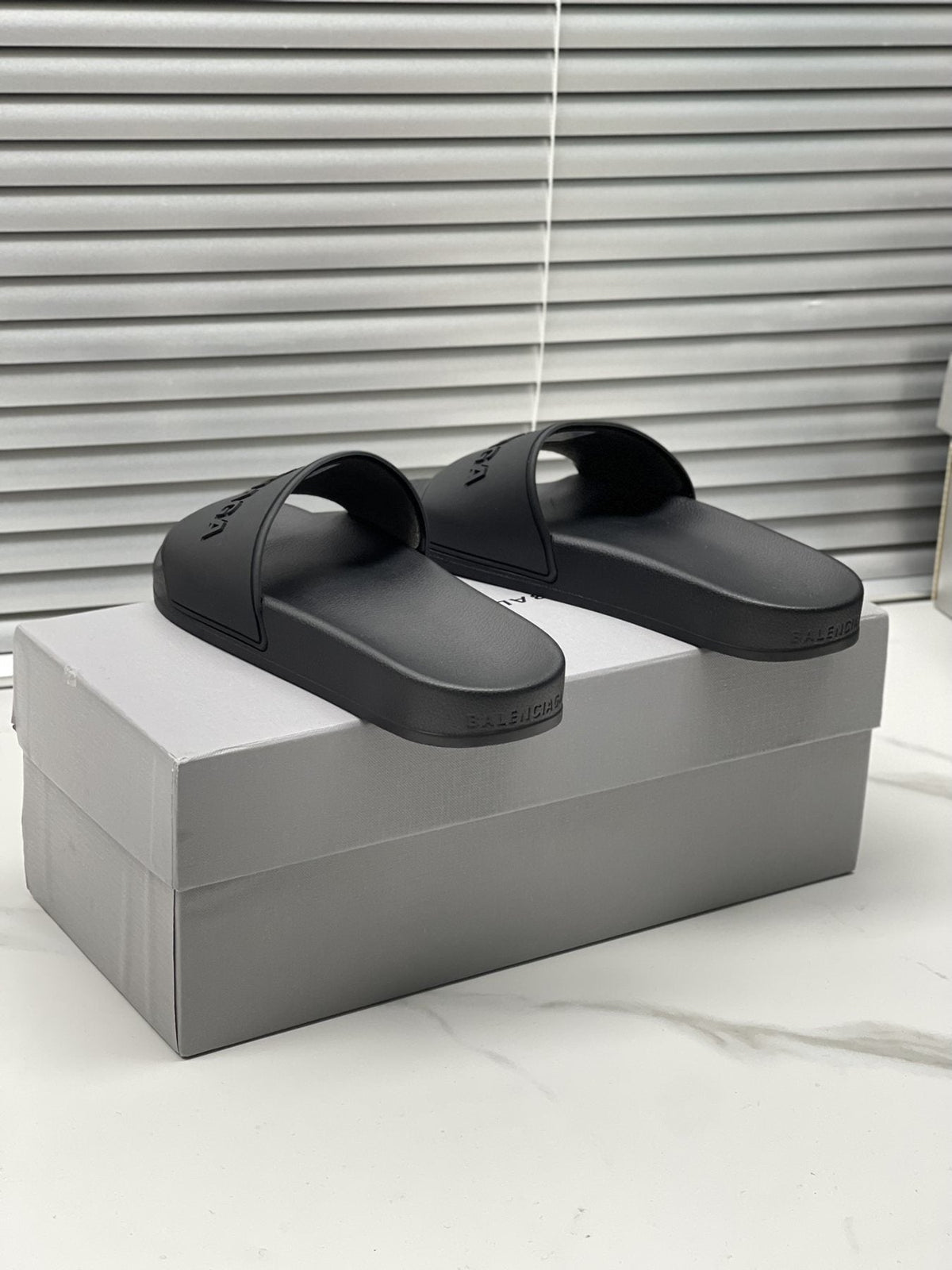 Balenciaga Black Embossed Slide Sandals — front