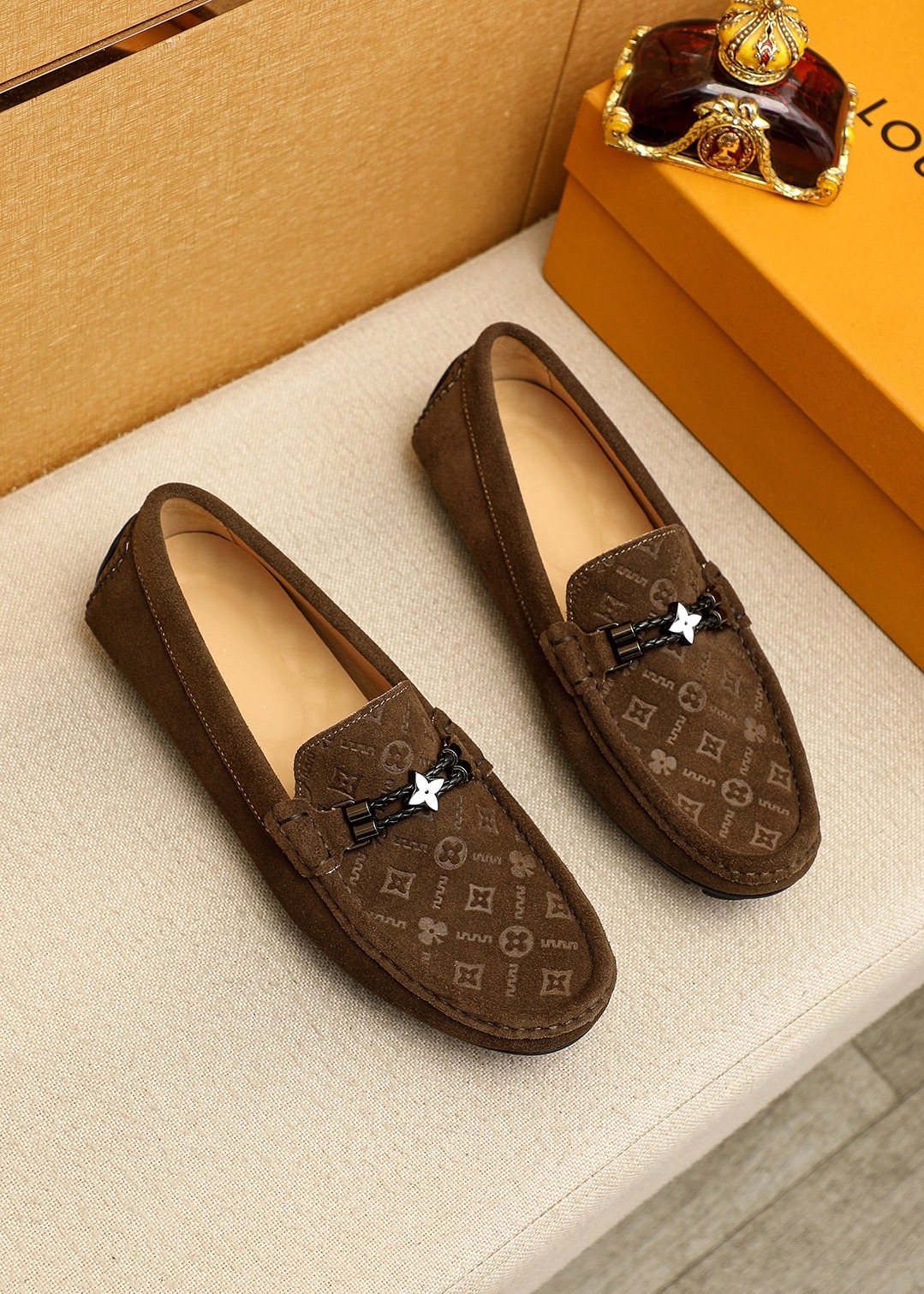 Louis Vuitton Embossed Metal-Detail Loafers — front