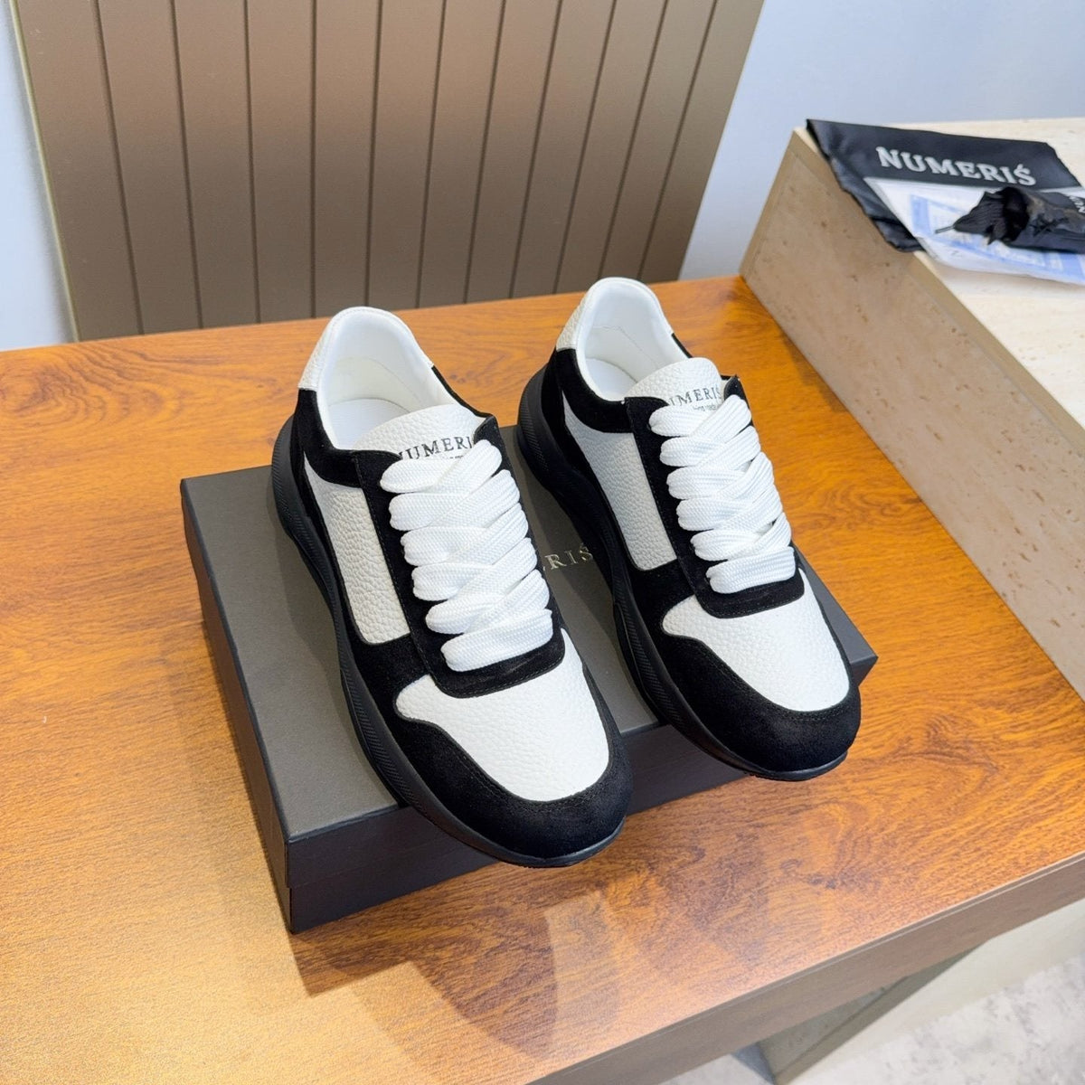 Numeris Paneled Low-Top Sneakers — front