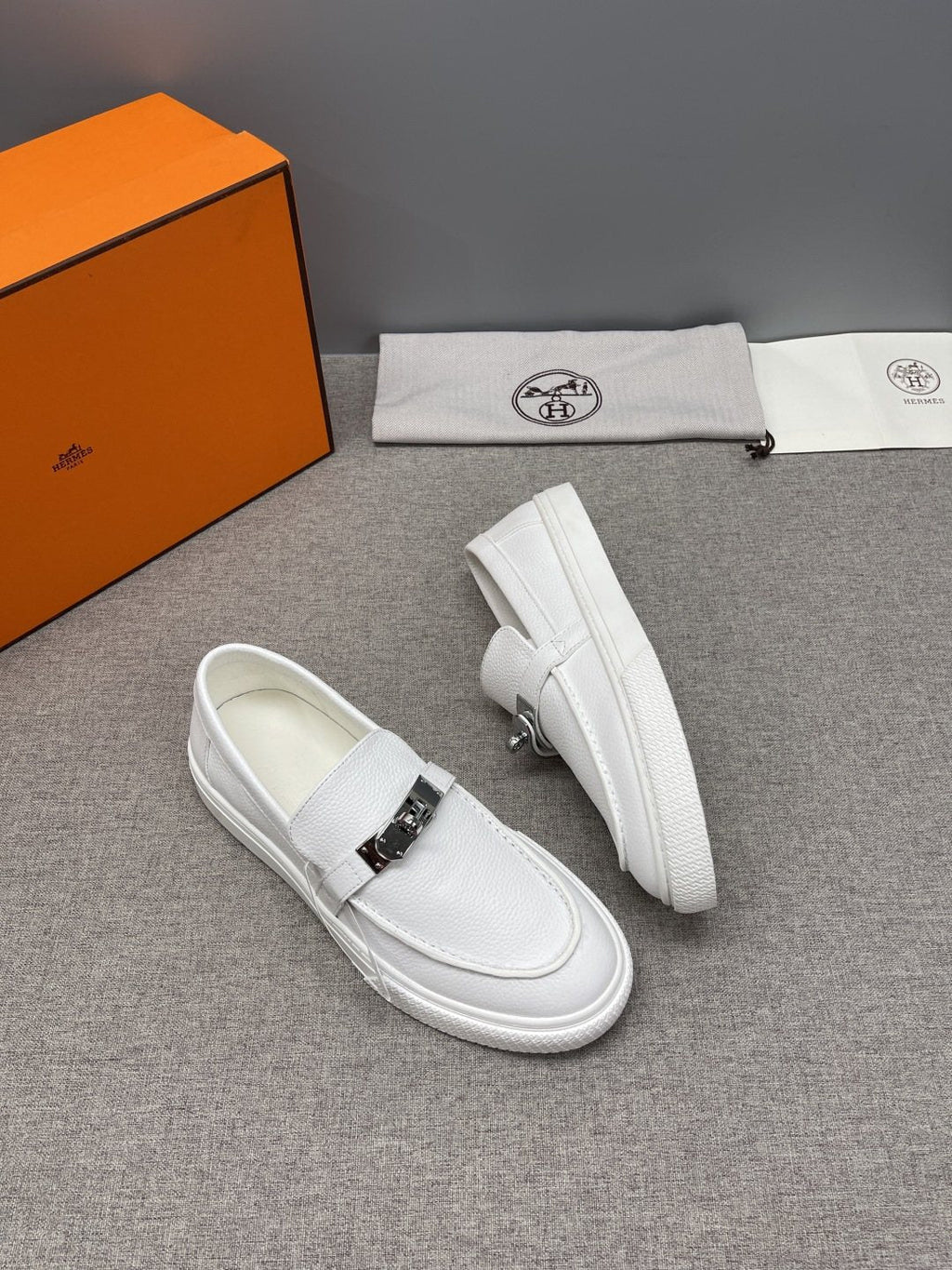 Hermès Textured Bar Loafers — front
