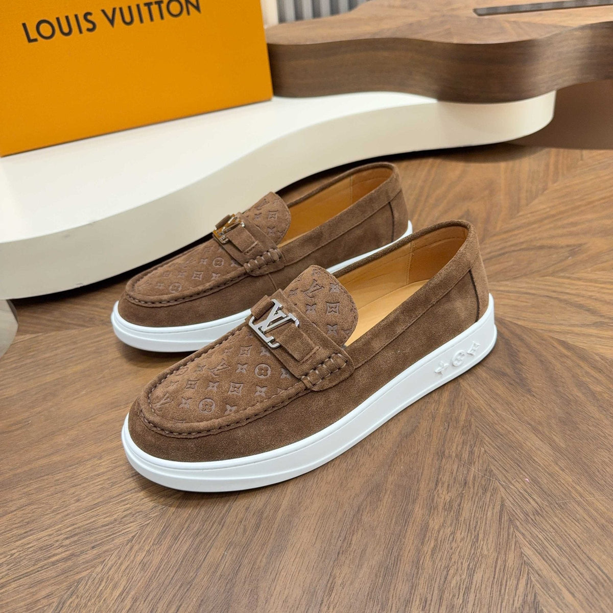 Louis Vuitton Embossed Slip-On Sneakers — front