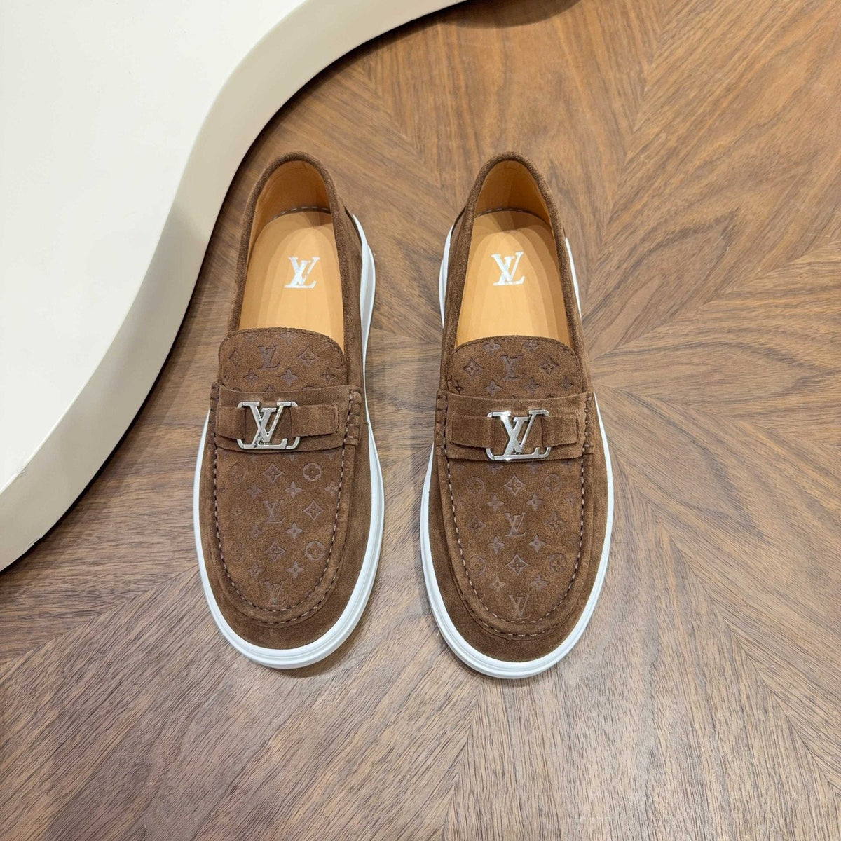 Louis Vuitton Embossed Slip-On Sneakers — front
