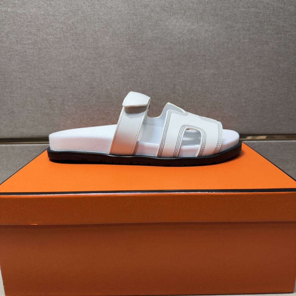 Hermès Cutout Slide Sandals — side
