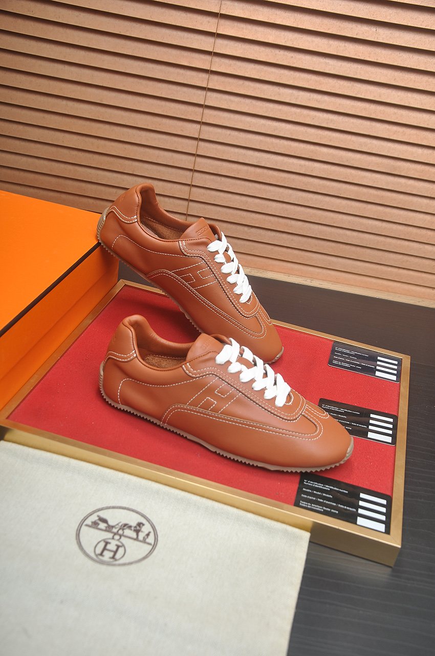 Hermès Low-Top Lace-Up Sneakers — side