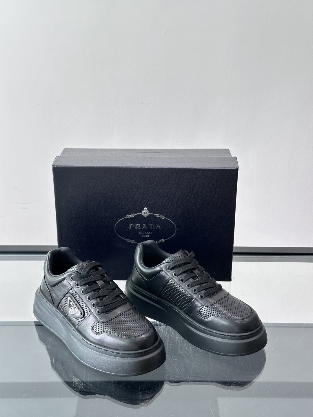 Prada Triangle Detail Low-Top Sneakers — front